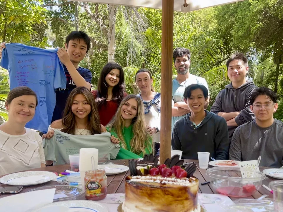Vlashi Lab members celebrate Hanna and Kevin's graduation.